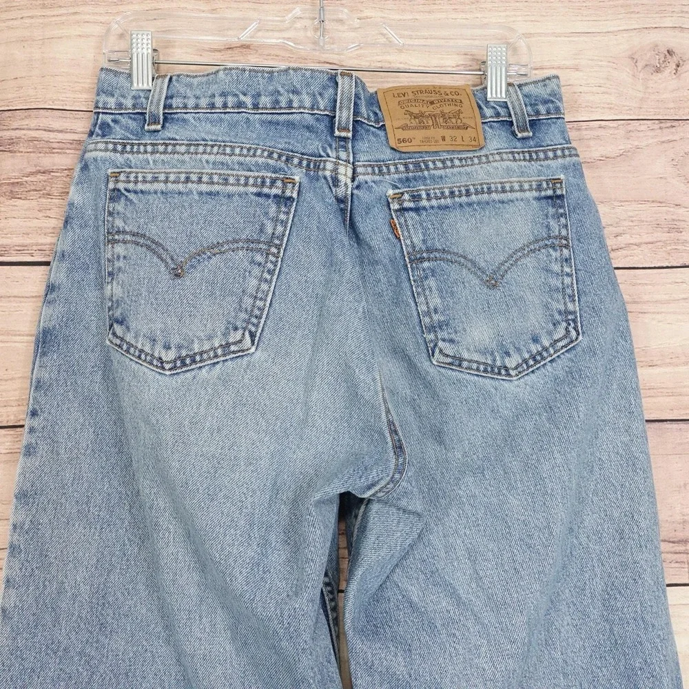 Vintage Levis 560 Jeans 32x34 (31x33) Blue Loose Tapered USA Orange Tab